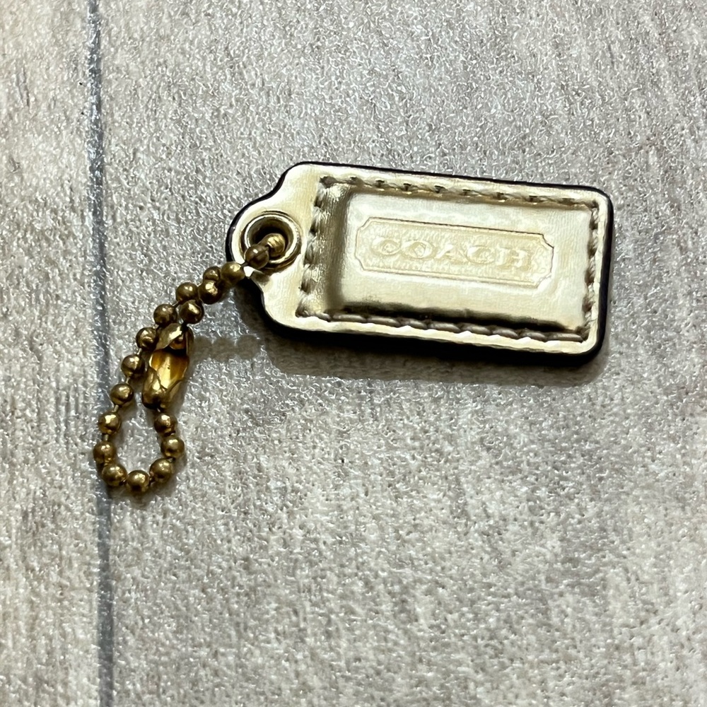 Coach Gold hang tag